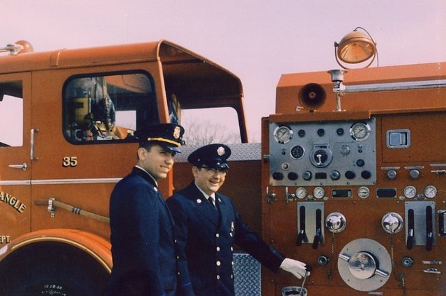 A historic lime-yellow Dumfries-Triangle fire apparatus
